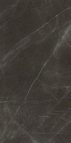 a black marble textured wall and floor