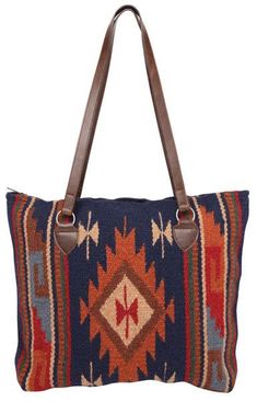 Step into a world of vibrant heritage with the Maya Tote Bag, a stunning example of handwoven Zapotec artistry. Each bag features unique, richly colored patterns crafted from the finest wool. This tote isn't just about looks—it's built for functionality too. Secure your items with a reliable zipper closure, enjoy the convenience of a fully lined interior, and keep essentials handy with an interior pocket. Whether you're running daily errands or embarking on a weekend adventure, the Maya Tote Bag Modern Purse, Blanket Purse, Wool Purse, Handcrafted Handbags, Saddle Blanket, Weaving Projects, Bag Ideas, Southwest Style, Rich Colors