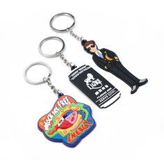 two key chains with cartoon characters on them