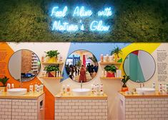 the interior of a store with three circular mirrors