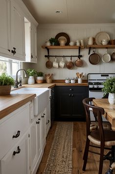 the kitchen is clean and ready to be used for cooking or baking, while also being used as a dining area