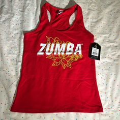 Zumba Smile Racerback Tank Top Size - Xs Brand New With Tags Red Racerback Casual Top, Red Cotton Racerback Tops, Casual Red Racerback Top, Red Racerback Tank Top For Gym, Red Sporty Racerback Top, Sporty Red Racerback Top, Red Cotton Racerback Tank Top, Casual Red Racerback Tank Top, Red Racerback Gym Top