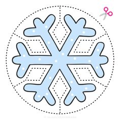 a paper snowflake cut out with scissors and thread on the side, ready to be sewn