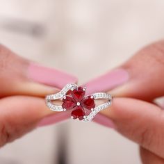 Product Details Dazzling Flower Engagement Ring is a mesmerizing piece set with Heart Shape Ruby stone in a flower design in the center. The spiral shank is encased with Round Shape Diamond in the prong setting. This Statement Ring is crafted in Solid Gold, a wonderful accessory for parties or weddings. Product Information SKU SHP-RINGS082019889 Width 2.5 mm Height 11 mm Weight 2.21 gm (Approximate) RUBY INFORMATION No.of Stones 4 Pieces Total Weight 1.88 Carat (Approximate) Dimension(approx) He Floral Engagement Ring, Flower Engagement Ring, Ruby Stone, Signature Jewelry, 18k Yellow Gold Ring, Timeless Jewelry, Conflict Free Diamonds, Yellow Gold Rings, Free Jewelry