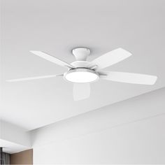 a white ceiling fan in a room