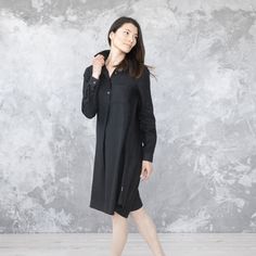 With a fluid, drapey silhouette and long sleeves, our Camilla linendress is versatile, comfortable and effortlessly stylish. Thanks to the understated gathered detailing to the cuffs and back, delicate buttons and two handy pockets, this linen dress works as beautifully on a summer picnic as in the office. Available in Black, Graphite, Marine Blue, Sea Blue It is made-to-order item hand-made individually for you. We would appreciate if you choose your size carefully and help us minimize the retu Blue Cotton Knee-length Shirt Dress, Denim Blue Knee-length Shirt Dress With Button Closure, Indigo Button-up Cotton Denim Dress, Linen Shirt Dress, Gray Linen, Striped Linen, Casual Elegance, Linen Dress, Linen Clothes