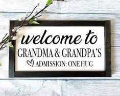 a sign that says, welcome to grandma and grandpa's graduation one - hug