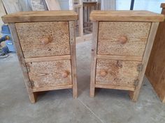 two wooden drawers sitting next to each other