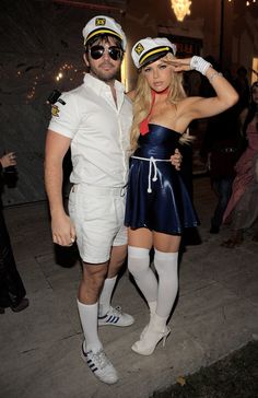 a man and woman dressed in sailor costumes