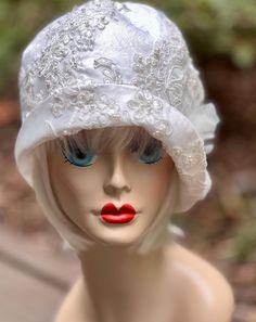 1920's Wedding  Cloche Hat  10 to 15% off after your review. My hats are so different than usual, They are comfortable.     If you're tired of wearing it for the day, it's made to be folded and put it in your purse.  There will be no wrinkles.                                 Step into the glamorous world of the Roaring Twenties with this stunning 1920's cloche hat. Inspired by the iconic styles of the Jazz Age, this handcrafted accessory is the perfect addition to any vintage lover's wardrobe. Vintage Gatsby Style Hat Headpiece, Gatsby Style Hat For Vintage Events, Gatsby Style Wedding Fascinator With Short Brim, Vintage Cloche Wedding Headpiece, Vintage Wedding Cloche Headpiece, Vintage Fitted Headpieces For Wedding, Vintage Fitted Wedding Headpiece, Adjustable Flapper Wedding Headpieces, Gatsby Style Cloche Hat For Kentucky Derby Wedding