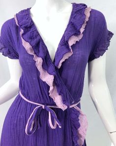 For Sale on 1stdibs - Amazing 1970s purple and lavender lightweight cotton voile short sleeve wrap dress ! Features a vibrant regal purple with lavender ruffle details. Elastic Purple Cotton Dress With Ruffles, 70s Fashion Purple, Purple Cotton Ruffle Dress, Luxury Purple Cotton Dress, Vintage Purple Mini Dress, Black Velvet Cocktail, 1970s Fitted Purple Dress, Vintage Purple Cotton T-shirt, Velvet Cocktail Dress