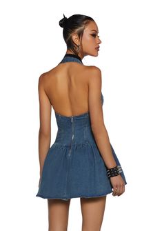 This mini dress has a denim construction, a halter neckline with an adjustable buckle closure, paneling, cut out details, and a back zipper closure. Summer Denim Mini Dress For Club, Denim Mini Dress For Club, Club Denim Mini Dress, Spring Blue Denim Club Dress, Fitted Blue Backless Denim Dress, Fitted Backless Blue Denim Dress, Fitted Blue Denim Backless Dress, Mini Denim Dress With Back Zipper, Blue Denim Backless Dress