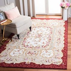 a living room area with a chair and rug