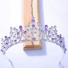 This Tiara is the perfect accessory for special events and occasions. Its durable metal structure and sparkling crystals will add a touch of royalty to any look. Perfect for weddings, proms, birthdays, bachelorette parties, even as a decadent cake topper! wedding bride nye new years , bridgerton experience crowns, ren faire headband, renaissance faire, cosplay convention, fit for a queen, princess, gift for a princess, gift for a queen, birthday gift idea, birthday gift for girl, bridgerton ball, historical crown, hair jewelry gift Hair Accessories Silver, Party Tiara, Crystal Crown Wedding, Rhinestone Headpiece, Bride Crown, Crown For Women, Prom Gift, Party Hair Accessories, Silver Tiara