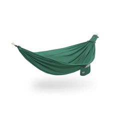 a green hammock hanging on a white background