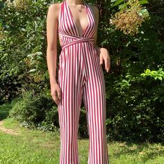 Stop People In Their Tracks With This Pinstripe Jumpsuit The Material Is Very Stretchy And Crazy Flattering! The Pants Are Long (I Am 5’5 For Reference) So Wearing Heels Or Pumps Are A Must! The Jumpsuit Is So Fun And Flirty And Perfect To Rock For College Game Days This Is Such A Favorite And I Need To Find Her The Perfect Home:) Measurements - 115 Cm From Waist To Bottom -Size S But Fits Xs And S Very Well I Only Wore It Once And Looks Brand New! No Stains, No Tears, No Pilling!! Pinstripe Jumpsuit, College Game Days, Long I, Very Well, Lady In Red, Pant Jumpsuit, Jumpsuit Romper, Red White, Red And White