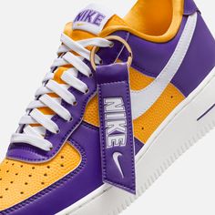 Style No. FJ1408-500 Color: Court Purple/White/University Gold/Sail Nike’s Be True to Your School collection gave 8 collegiate programs with the first team basketball shoe with its release of the Nike Dunk High. This women’s exclusive collection of footwear now taps the iconic Air Force 1 Low for a staple varsity-style color blocking. This color scheme is perfect for fans of the Los Angeles Sparks or LSU Tigers. Nike Air Force 1 SE Women's Shoes. Basketball Texture, Nike Dunk Lows, Nike Air Force 1 Custom, Shoe Palace, Kids Uniforms, Yellow Nikes, Shoes Purple, Purple Nikes, Lifestyle Shoes