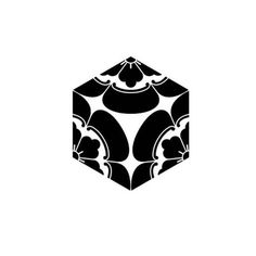 a black and white image of a cube with flowers on it's sides, in the shape of a hexagonal object