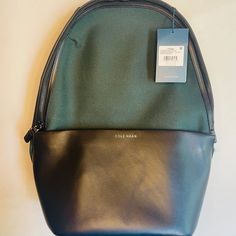 Cole Haan Black Leather & Green Backpack. New With Tags. Leather Handled Backpack For Commuting, Modern Green Leather Backpack For Travel, Modern Green Leather Backpack, Green Leather Travel Backpack With Removable Pouch, Black Crossbody Backpack For Commuting, Green Travel Bags With Leather Backing, Modern Green Standard Backpack, Modern Green Backpack With Removable Pouch, Green Commuting Bag With Adjustable Strap