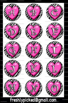 pink and black heart shaped stickers with the letter d on it's side