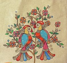 two colorful birds sitting on top of a tree with leaves and flowers in the branches