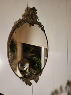 a mirror that is hanging on the wall