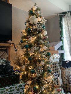 a decorated christmas tree in a living room