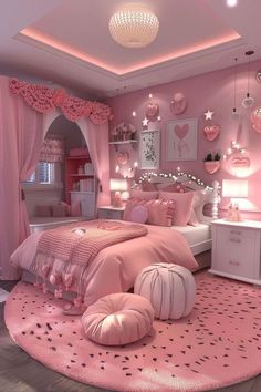 a bedroom decorated in pink and white with stars on the ceiling, lights hanging from the ceiling