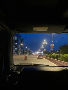 the view from inside a vehicle at night