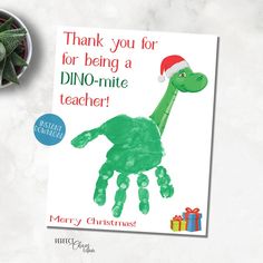 a handprinted christmas card for a dinosaur teacher