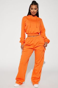 Available In Orange And Green. Wide Leg Joggers Elastic Waistband Cargo Pockets Pair With "Easy Going Lounge Hoodie" 80% Cotton 20% Polyester Imported | Easy Going Lounge Wide Leg Pant in Orange size Medium by Fashion Nova Orange Sweatpants Outfit, Orange Sweatpants, Lounge Fashion, Wide Leg Joggers, Orange Pants, Simple Fits, Orange And Green, Cute Comfy Outfits, Wide Leg Pant