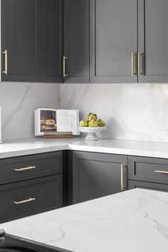 a white marble counter top in a kitchen