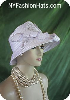 Women's Couture Designer White Satin Sculptured Abstract Slant Brim Fashion Bridal Hat. This Formal White Wedding Hat Is Trimmed With A Satin Extension And Satin Floral Leaves Embedded With White Encased Clear Acrylic Rhinestones. The Brim Tilts Downward On This Classic Styled Dress Hat. This Elegant Dress Hat Will Make A Fashion Statement. This Would Be A Beautiful Hat For A Bride.  This Statement Hat Is Custom Made And Designed By NY Fashion Hats Couture Millinery Headwear Apparel. This Hat Is Bespoke Hats, Royal Ascot Hats, Veiled Hats, Couture Hats, Bridal Hat, Elegant Hats, Wedding Hat, Ny Fashion, Couture Designers