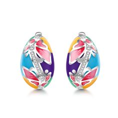 This beautifully detailed earring boasts charming butterflies and flowers in bright shades of multicolored enamel. The intricate flawless enamel work coupled with white stones, make this an eye-catching piece. Inspired by the serene beauty of nature, this ring will brighten up even the dullest of days in your life. With a myriad of colours everywhere, why not add some to your jewelry box with beautiful enamel jewelry.Carat Weight: 0.238 ctStone Size: 1,0.8 mmStone Type: Jeulia® StoneNumber of St Multicolor Enamel Earrings, Multicolor Enamel Flower Earrings, Multicolor Flower Enamel Earrings, Dreamy Garden, Butterflies And Flowers, White Stones, Butterfly Flower, Sterling Silver Hoop Earrings, Butterfly Flowers