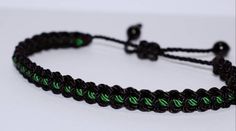 Black braided bracelet with a  green Line, adjustable wristband -new -handmade -for man & woman Braided Bracelet, Black Braids, Braided Bracelets, Infinity Bracelet, Rope Bracelet, Easy To Use, Braids, Jordan, Handmade Items