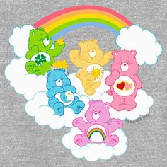 four teddy bears sitting on clouds with a rainbow in the background