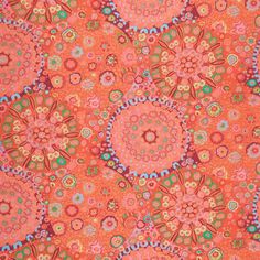 an orange background with colorful flowers and circles