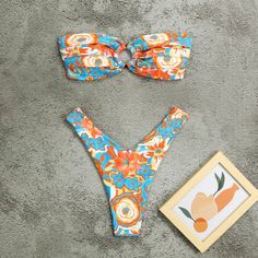 Introducing our Tropical Print Beach Bikini Set - crafted from a comfortable and stretchy blend of nylon and Terylene. Enjoy a sultry silhouette adorned with a captivating mix of solid colors and playful prints, perfect for the confident and vibrant beachgoer. Designed with a wire-free support system for a natural and comfortable feel. Designed by Thekittenpark Nylon Tankini For Beach Party, Floral Print Stretch Swimwear For Beachwear, Stretch Floral Print Swimwear For Beachwear, Blue Nylon Tankini For Vacation, Nylon Tankini For Beach Party Season, Stretch Floral Print Beachwear Swimwear, Stretch Multicolor Swimwear For Beach, Nylon Swimwear For Vacation, Beachy Nylon Swimwear For Sunbathing