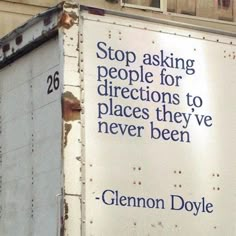 a sign on the side of a building that says stop asking people for directions to places they've never been