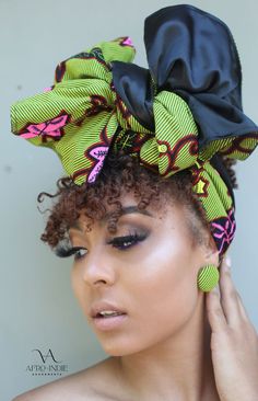 I am “Fa’Izah“ and my name means Victorious in the Nigerian Hausa language!!! I am lovingly handmade in beautiful African print fabric, boasting of a vibrant yellow, green, and black striped base with large gorgeous leaves in black and hot pink trimmed in red. That’s right Queen, your edges are safe with me. It can be used as a head-wrap, a Bantu top, a wrap scarf around your dress, pants, or skirt…..yes, endless options and maximum versatility is what I provide.