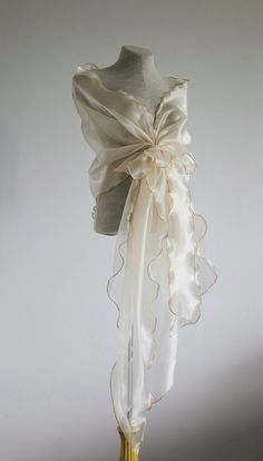 Mother of the bride shawl. Evening cover up. Organza shawl. Shoulder cover up. Evening wrap. Stole. Elegant design evening wrap made with holder flower style. You can look dress up on this shawl even with simple dress. Champagne organza shawl. Shawl has adjustable flower holder which easy to adjust on shoulders as needs.  Fabric - sheer  organza.  {{ SIZE : whole length 90" ,width 20"}} {{ CARE: warm water hand wash , hang up to dry, low temperature iron! }} COLORS: keep in mind that colors of i Organza Shawl, Detail Couture, Evening Shawls, Bridal Cover Up, Gaun Fashion, Flower Fashion, Fancy Dresses, Costume Design, Shawls And Wraps