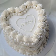 a heart shaped cake on a white plate