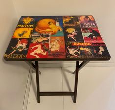 a table that has some pictures on the top and sides of it with different colors