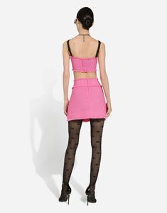 Raschel tweed miniskirt: Pink Regular rise A-line Leopard-print stretch satin lining Rear zipper and hook-and-eye fastening The piece measures 40 cm from the waist down on a size IT 40 The model is 175 cm tall and wears a size IT 40 Made in Italy Pink Tweed Skirt, Tweed Midi Skirt, Dolce And Gabbana Eyewear, Pink Tweed, Latest Skirts, Tweed Mini Skirt, Knee Skirts, Tweed Skirt, Fall Skirts