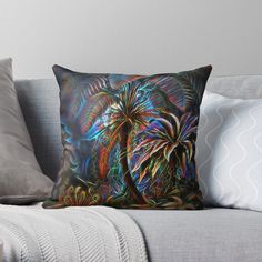 an abstract painting with palm trees in the background on a couch throw pillow by artfuldesign