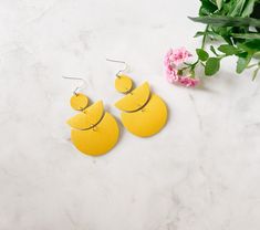 bright yellow stacked half moon and moon shape leather earrings Brass Hooks, Muslin Bags, Boho Modern, Brass Hook, Chic Leather, Sunny Yellow, Canadian Rockies, Bold Style, Earring Cards