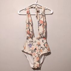 Size small One piece swimsuit Vintage Halter Neck Swimwear For Summer, Beige One-piece Swimwear For The Beach, Vintage One-piece Swimwear For Beach, Vintage One-piece Swimwear For Vacation, Beachy One-piece Bodysuit For Spring, Spring Beachy One-piece Bodysuit, Beige Lined Swimwear For Spring, Beige One-piece Summer Swimwear, Spring Beige Lined Swimwear