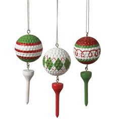 three christmas ornaments hanging from chains on a white background, one is green and the other is red