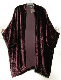 NNWT Eskandar DARK SHIRAZ Velvet 36" Long Duster Jacket Generous Size (0) $1595 COLOR:  DARK SHIRAZ (LOOKS LIKE A DARK PURPLE)   Shawl collar, open front, 3/4 sleeves with drop shoulder. Measurements All of the measurements are approximate and measured laying flat than doubled.    Since sizes do vary,   so please e-mail me before bidding if you are not sure about sizing.   Bust 62”, Hem 62”, Length 36” Material 82% Viscose, 18% Silk  Care Dry Clean Made in England by Eskandar     NO RETURNS, REF Velvet Shrug Long, Dark Bohemian Fashion, Velvet Duster, Purple Shawl, Unusual Clothes, Velvet Cloth, Long Duster, Velvet Clothes, Velvet Coat