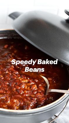 a pot filled with baked beans and the words speedy baked beans above it in white text